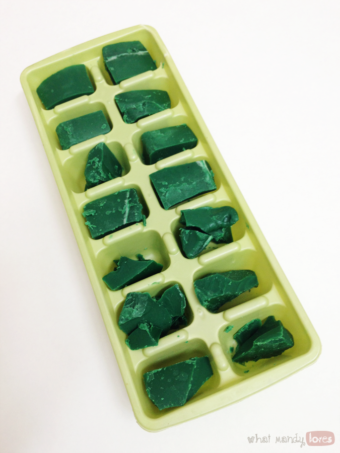 What Mandy Loves: Image of a ice cube tray full of green candle wax via www.whatmandyloves.com